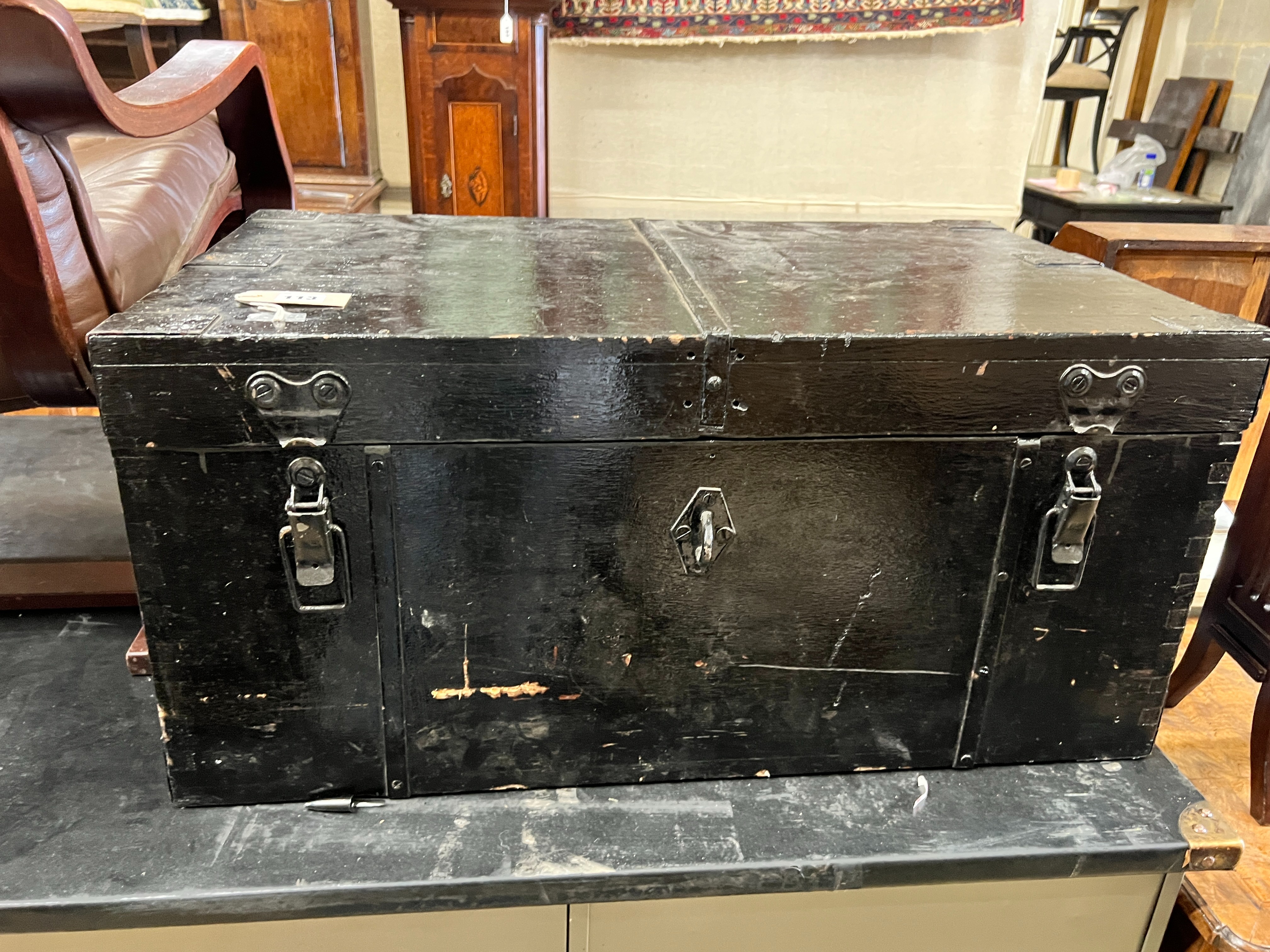 A painted iron bound chest containing a large quantity of assorted hand tools